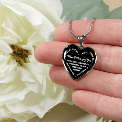 TO OUR DAUGHTER, YOU ARE BRAVER, MOM & DAD LOVE YOU - GOLD AND SILVER FINISHED HEART SHAPED NECKLACE AND BANGLE BRACELET (WHITE TEXT ON BLACK) EO