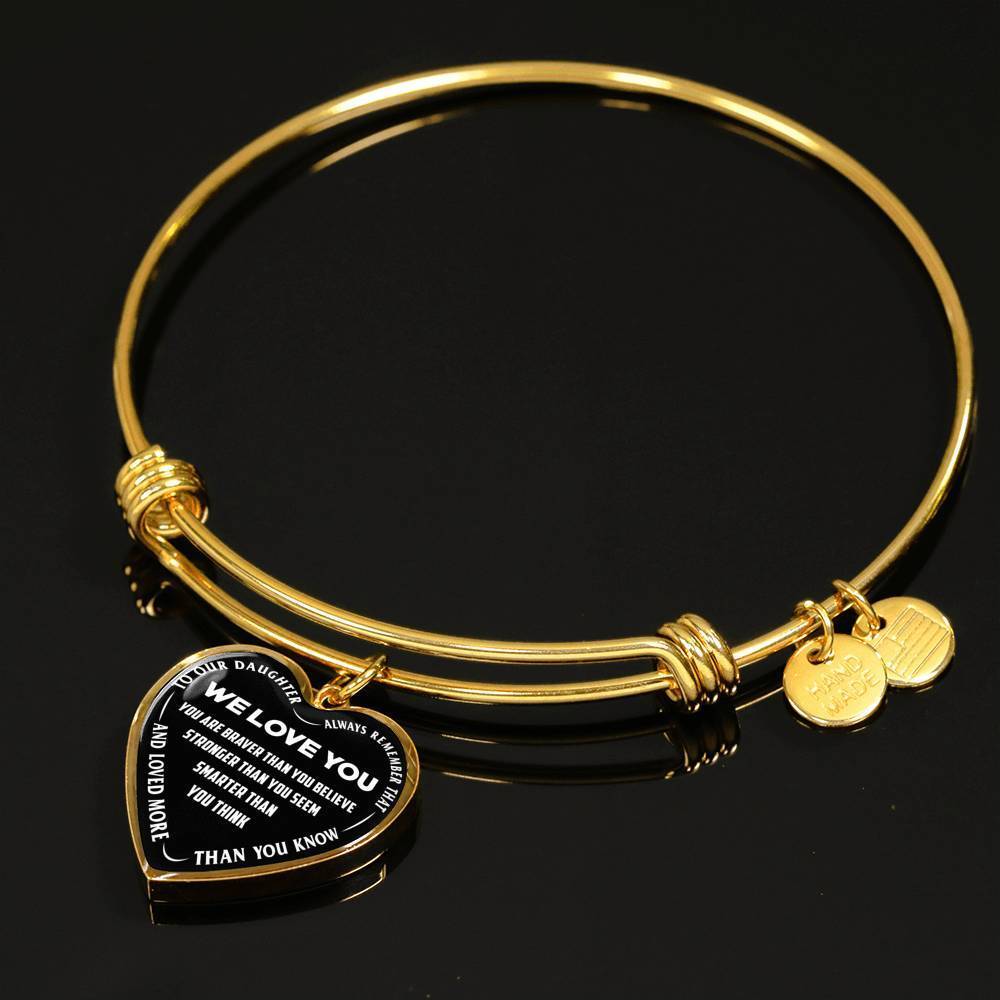 TO OUR DAUGHTER, ALWAYS REMEMBER THAT, WE LOVE YOU - (WHITE ON BLACK) SILVER OR GOLD FINISHED HEART SHAPED BANGLE BRACELET NEW