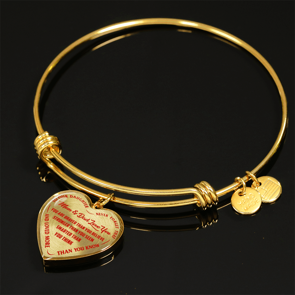 TO OUR DAUGHTER, YOU ARE BRAVER, MOM & DAD LOVE YOU - GOLD AND SILVER FINISHED HEART SHAPED NECKLACE AND BANGLE BRACELET (RED TEXT ON TRANSPARENT) EO
