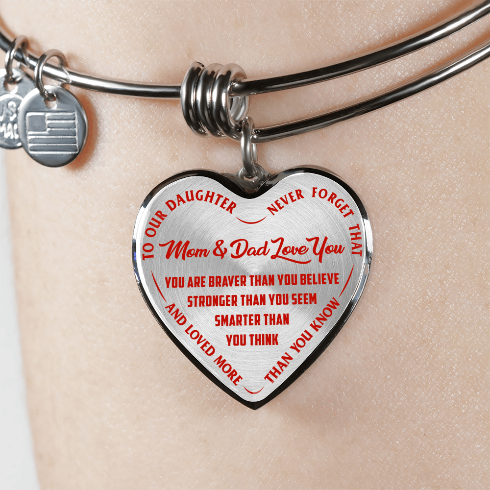 TO OUR DAUGHTER, YOU ARE BRAVER, MOM & DAD LOVE YOU - GOLD AND SILVER FINISHED HEART SHAPED NECKLACE AND BANGLE BRACELET (RED TEXT ON TRANSPARENT) EO