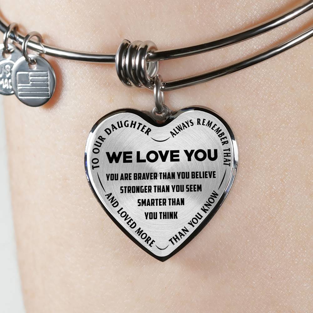 TO OUR DAUGHTER, ALWAYS REMEMBER THAT, WE LOVE YOU - (BLACK ON TRANSPARENT) SILVER OR GOLD FINISHED HEART SHAPED BANGLE BRACELET NEW