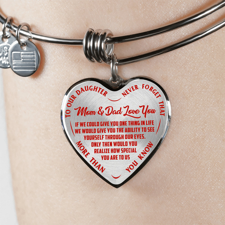 TO OUR DAUGHTER, MOM & DAD LOVE YOU, NEVER FORGET THAT - GOLD AND SILVER FINISHED HEART SHAPED BANGLE BRACELET (RED TEXT ON TRANSPARENT)