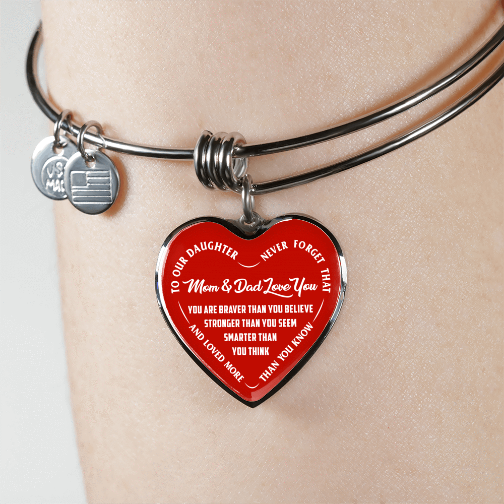 TO OUR DAUGHTER, YOU ARE BRAVER, MOM & DAD LOVE YOU - GOLD AND SILVER FINISHED HEART SHAPED NECKLACE AND BANGLE BRACELET (WHITE TEXT ON RED) EO