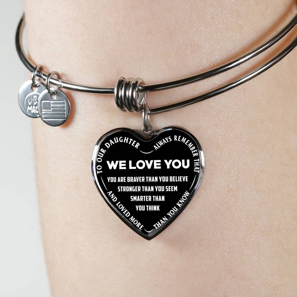 TO OUR DAUGHTER, ALWAYS REMEMBER THAT, WE LOVE YOU - (WHITE ON BLACK) SILVER OR GOLD FINISHED HEART SHAPED BANGLE BRACELET NEW