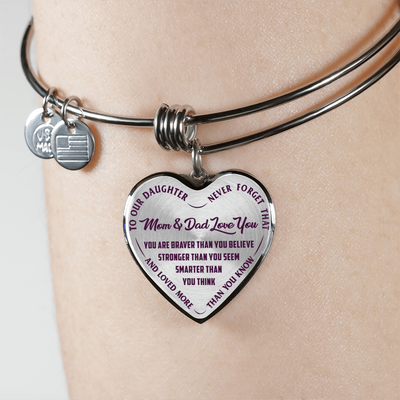 TO OUR DAUGHTER, YOU ARE BRAVER, MOM & DAD LOVE YOU - GOLD AND SILVER FINISHED HEART SHAPED NECKLACE AND BANGLE BRACELET (PURPLE TEXT ON TRANSPARENT) EO