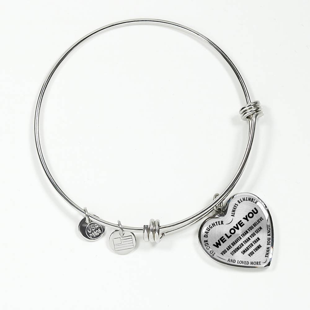 TO OUR DAUGHTER, ALWAYS REMEMBER THAT, WE LOVE YOU - (BLACK ON TRANSPARENT) SILVER OR GOLD FINISHED HEART SHAPED BANGLE BRACELET NEW