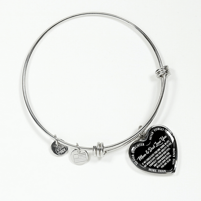 TO OUR DAUGHTER, MOM & DAD LOVE YOU, NEVER FORGET THAT - GOLD AND SILVER FINISHED HEART SHAPED BANGLE BRACELET (WHITE TEXT ON BLACK)