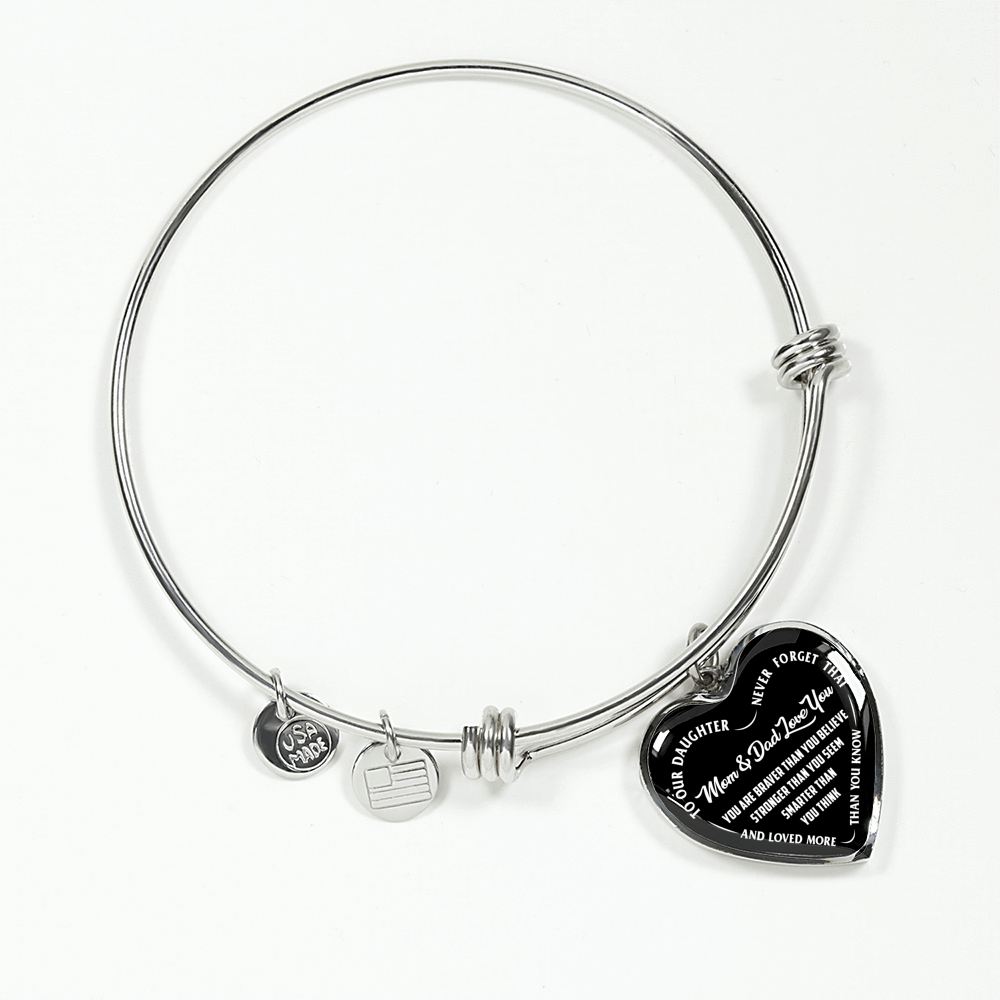 TO OUR DAUGHTER, YOU ARE BRAVER, MOM & DAD LOVE YOU - GOLD AND SILVER FINISHED HEART SHAPED NECKLACE AND BANGLE BRACELET (WHITE TEXT ON BLACK) EO