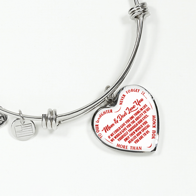 TO OUR DAUGHTER, MOM & DAD LOVE YOU, NEVER FORGET THAT - GOLD AND SILVER FINISHED HEART SHAPED BANGLE BRACELET (RED TEXT ON WHITE)