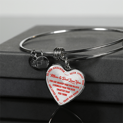 TO OUR DAUGHTER, YOU ARE BRAVER, MOM & DAD LOVE YOU - GOLD AND SILVER FINISHED HEART SHAPED NECKLACE AND BANGLE BRACELET (RED TEXT ON TRANSPARENT) EO