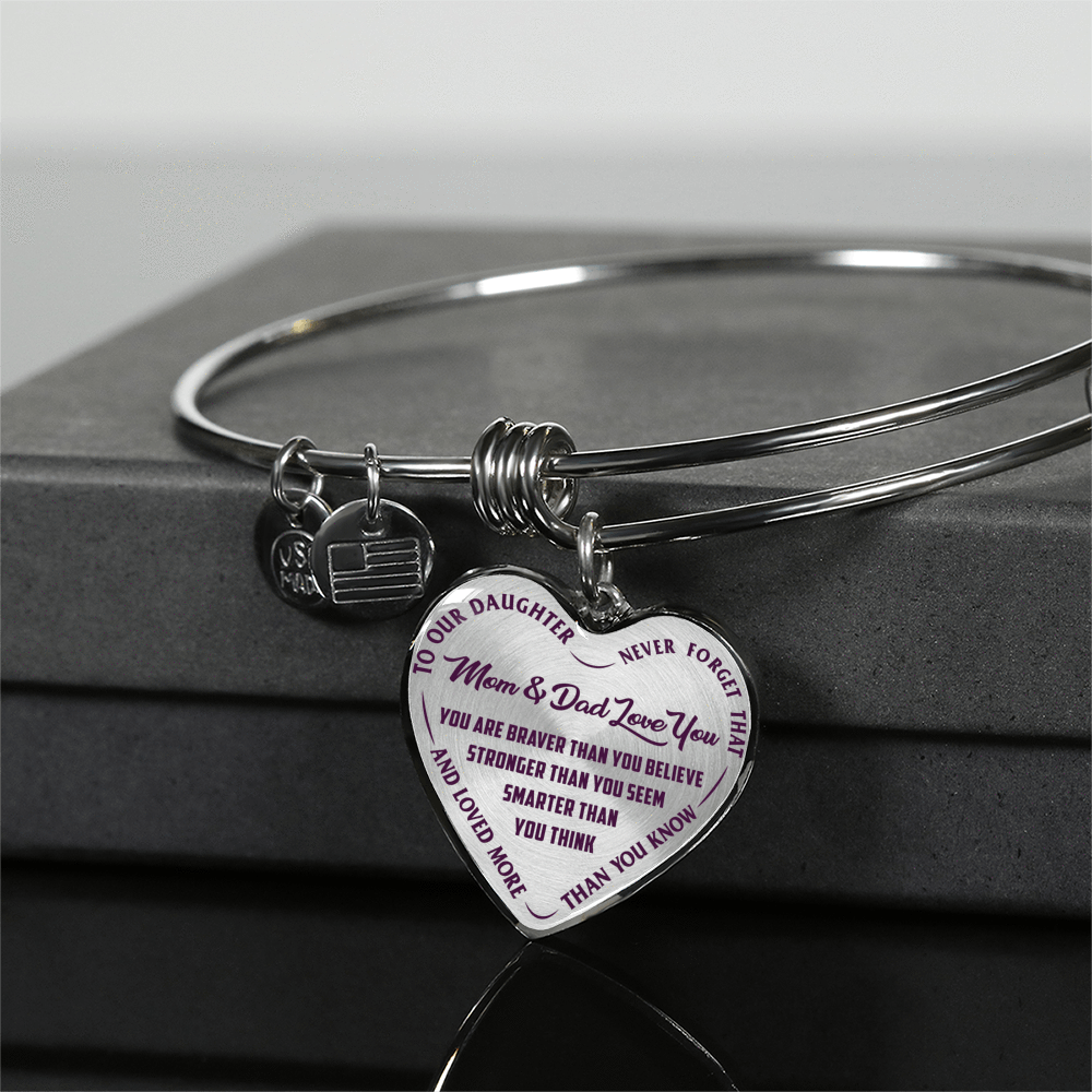 TO OUR DAUGHTER, YOU ARE BRAVER, MOM & DAD LOVE YOU - GOLD AND SILVER FINISHED HEART SHAPED NECKLACE AND BANGLE BRACELET (PURPLE TEXT ON TRANSPARENT) EO