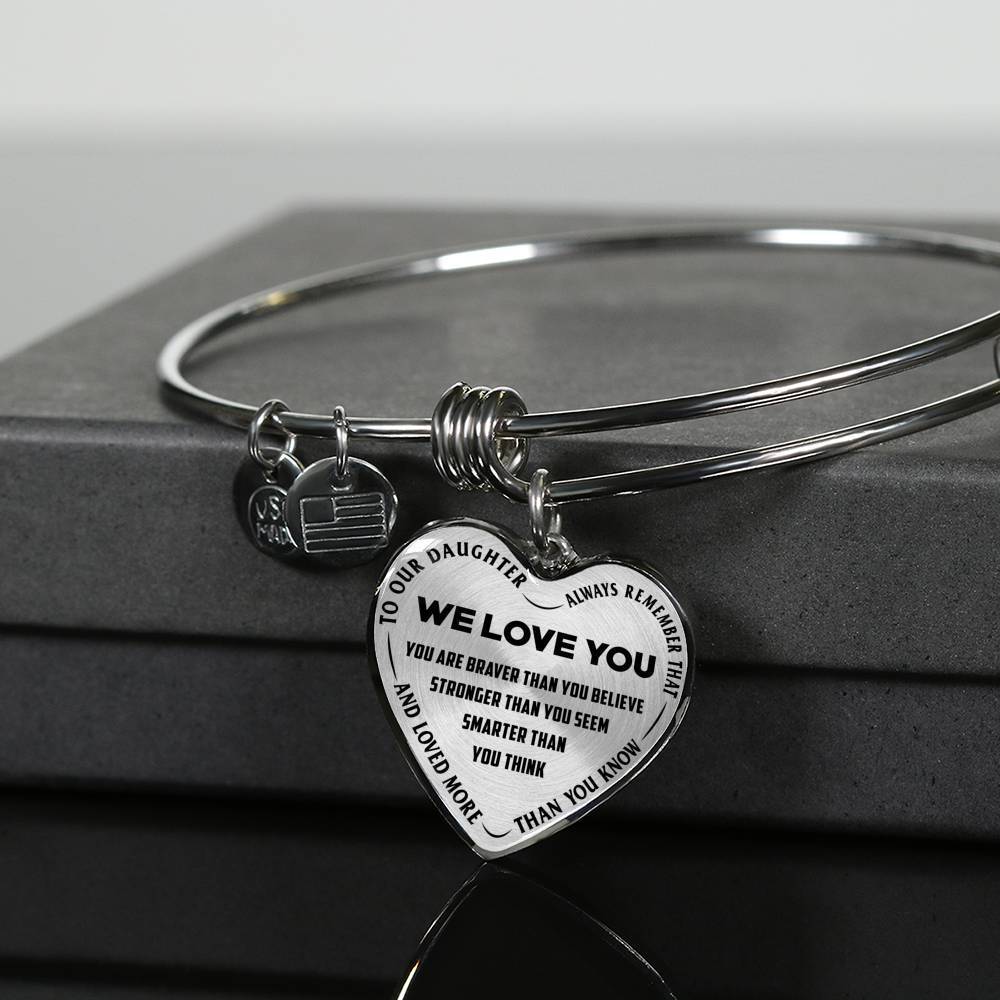 TO OUR DAUGHTER, ALWAYS REMEMBER THAT, WE LOVE YOU - (BLACK ON TRANSPARENT) SILVER OR GOLD FINISHED HEART SHAPED BANGLE BRACELET NEW
