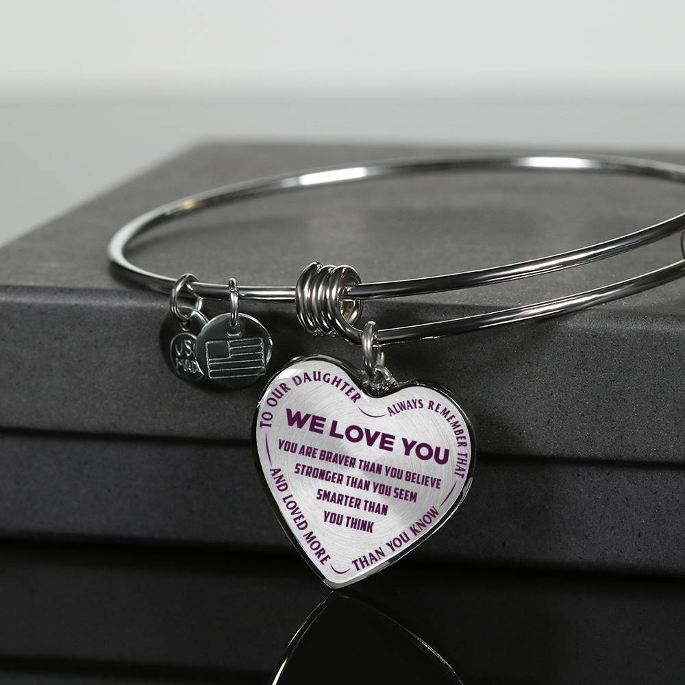TO OUR DAUGHTER, ALWAYS REMEMBER THAT, WE LOVE YOU - (PURPLE ON TRANSPARENT) SILVER OR GOLD FINISHED HEART SHAPED BANGLE BRACELET NEW
