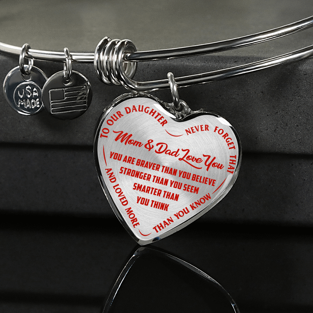TO OUR DAUGHTER, YOU ARE BRAVER, MOM & DAD LOVE YOU - GOLD AND SILVER FINISHED HEART SHAPED NECKLACE AND BANGLE BRACELET (RED TEXT ON TRANSPARENT) EO
