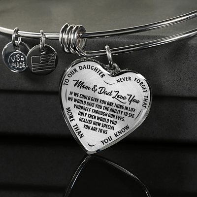 TO OUR DAUGHTER, MOM & DAD LOVE YOU, NEVER FORGET THAT - GOLD AND SILVER FINISHED HEART SHAPED NECKLACE AND BANGLE BRACELET(BLACK TEXT ON TRANSPARENT) EO