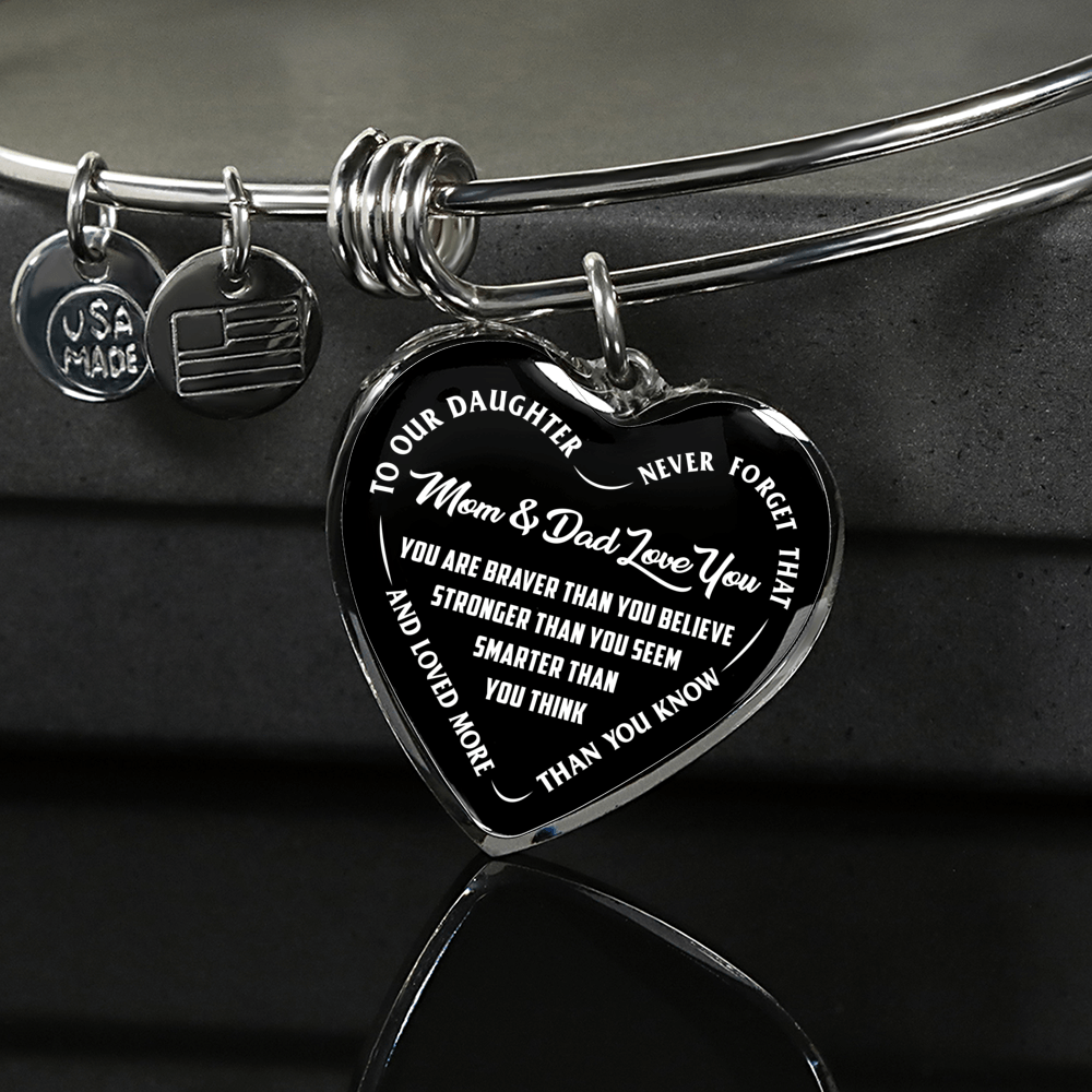 TO OUR DAUGHTER, YOU ARE BRAVER, MOM & DAD LOVE YOU - GOLD AND SILVER FINISHED HEART SHAPED NECKLACE AND BANGLE BRACELET (WHITE TEXT ON BLACK) EO